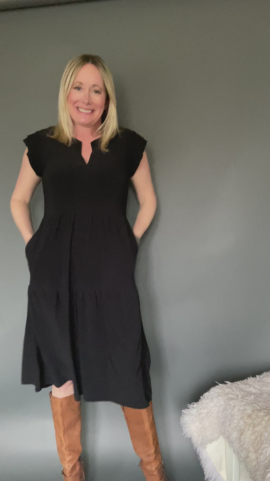 Load and play video in Gallery viewer, Black Ruffle Sleeve Dress
